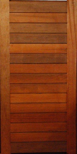 Picture of a stained and treated Meranti Horizontal Slatted Pivot Door 