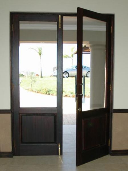 Picture of the Full Pane Top Solid Bottom 1613 mm x 2032 mm Exterior Door shown installed and with one door open