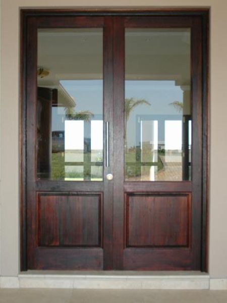 Picture of the Full Pane Top Solid Bottom 1613 mm x 2032 mm Exterior Door shown installed and with both doors closed