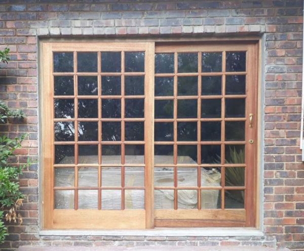 Photo of the Strongwood Sliding Door (Left Hand Fixed) 2400 mm x 2115 mm installed as an outside doorway